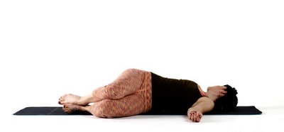 Gentle supine twist stretch before bed to relieve lower back pain